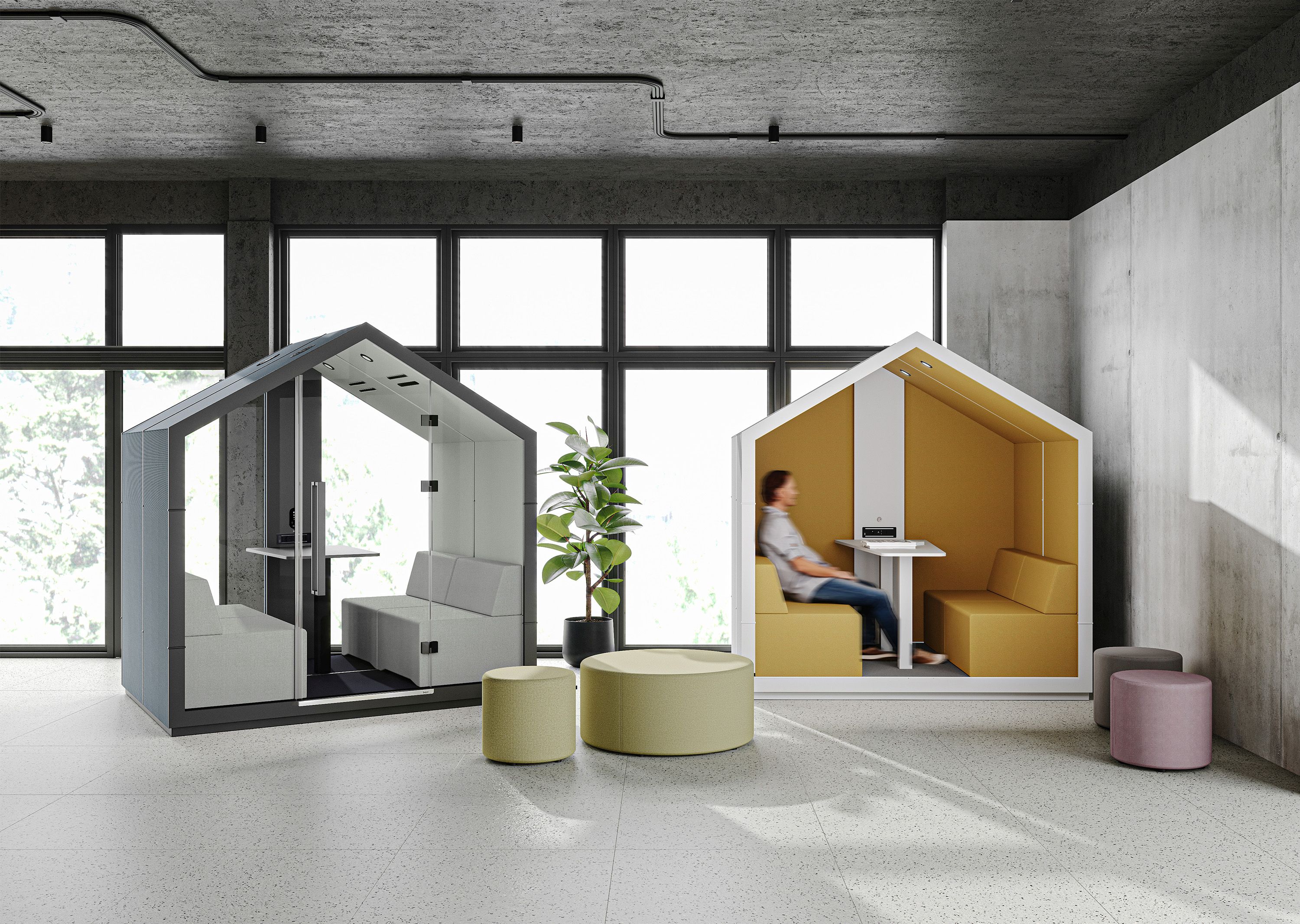 treehouse TH 4 Akustikmöbel: Zwei moderne Telefonzellen mit Sitzgelegenheiten und Person im Büro.